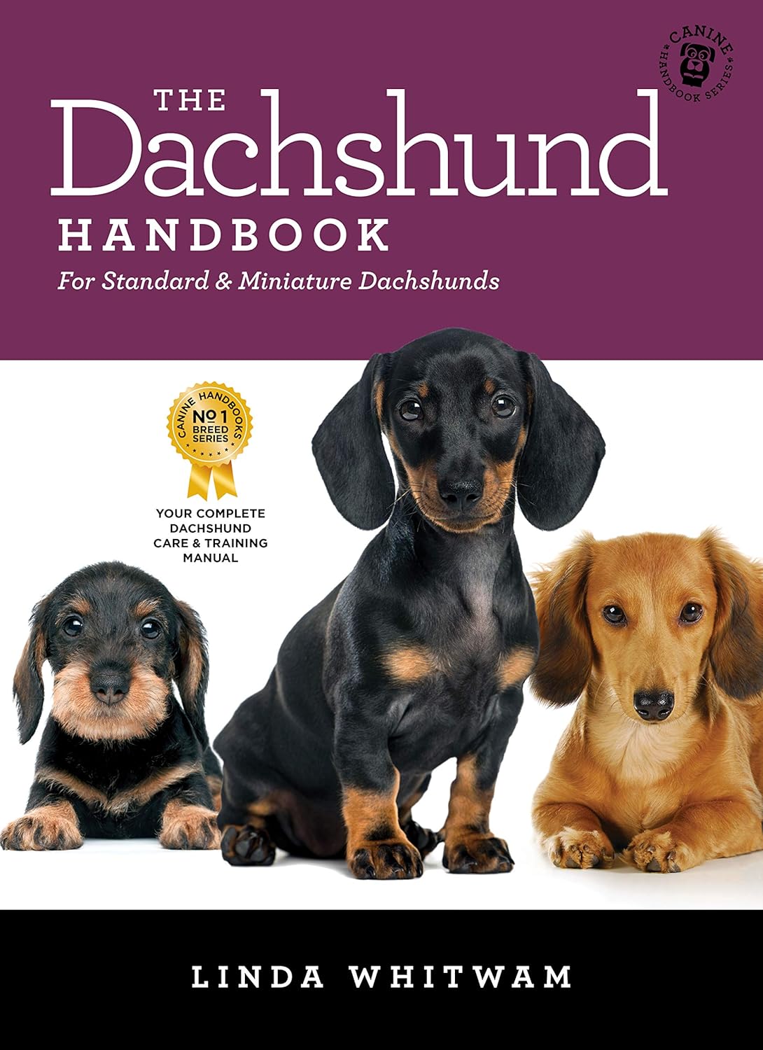 'Canine Handbooks dog training guide displayed on a Kindle device'